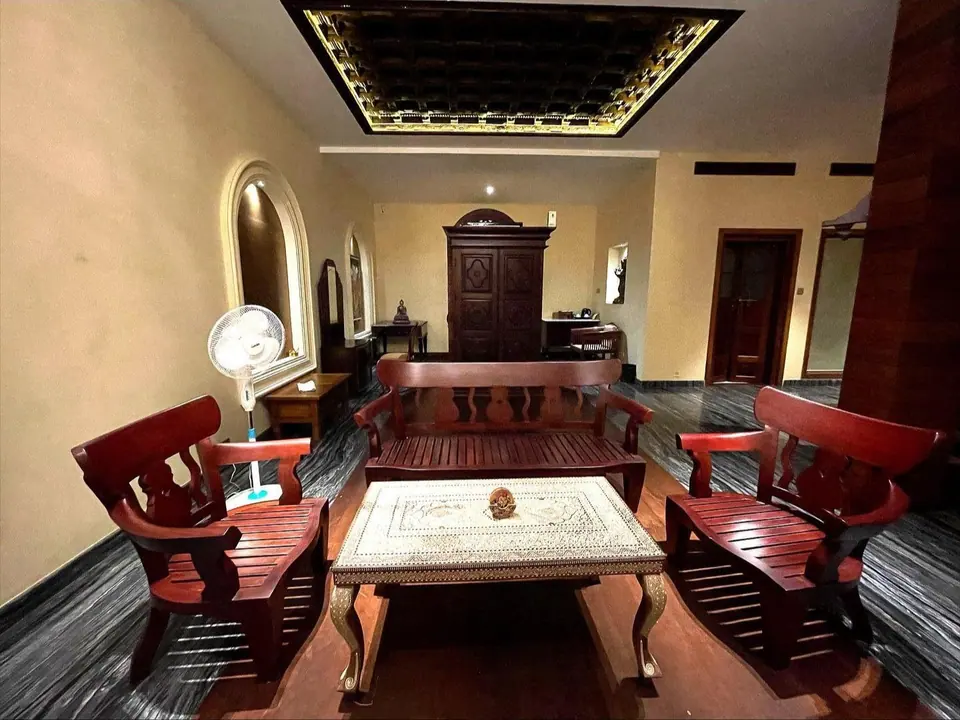 A regal carved sofa