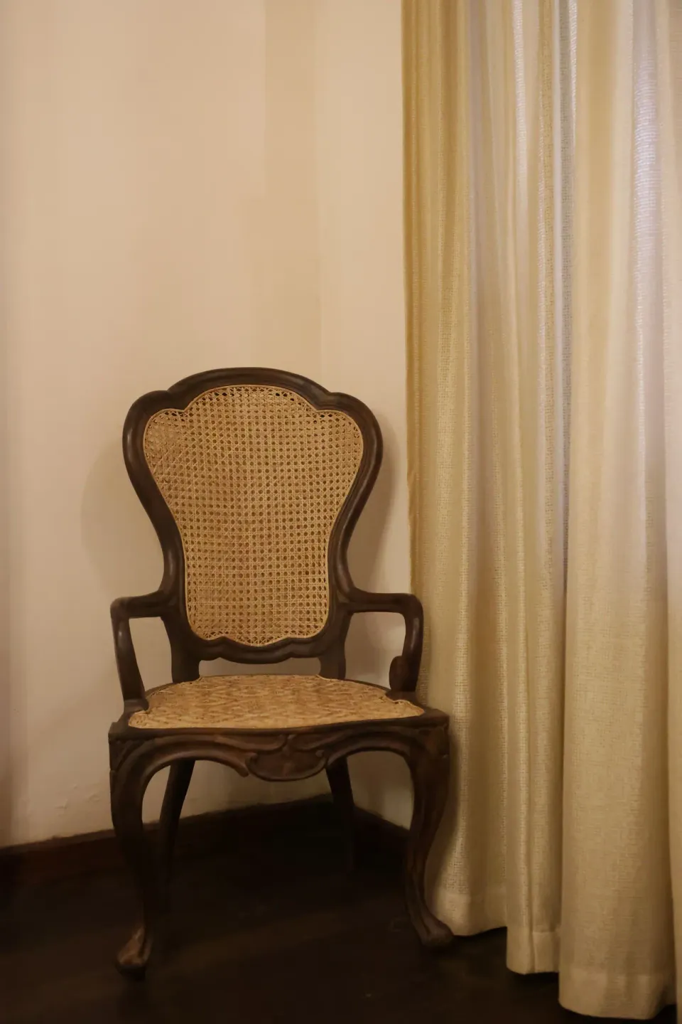 Classic Wooden Cane-Back Armchair