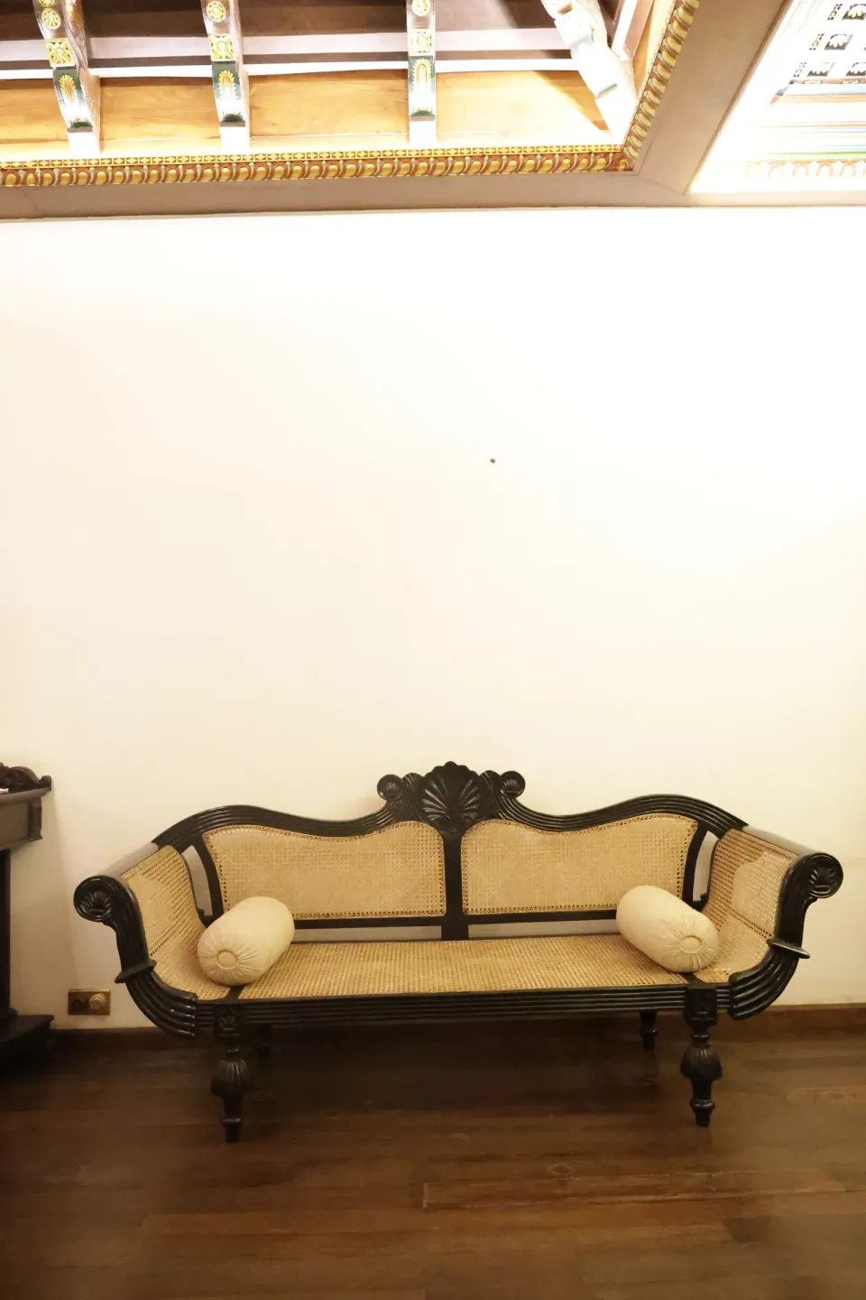 Elegant Wooden Cane-Back Sofa